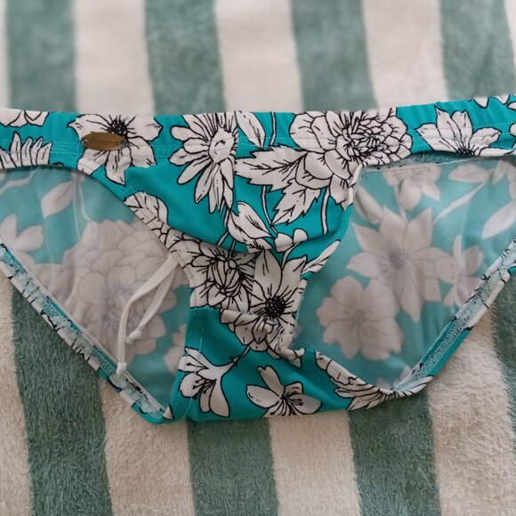 NEPTUNE DESIGNER SWIMBRIEF, SIZE SMALL, WHITE FLOWERS ON TEAL (Pre-Owned) - Picture 1 of 10